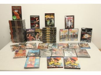 Approx. 55 Sealed DVD's & DVD Box Sets: Bruce Lee, Chris Angel, Bonnie & Clyde, & Many Old Movies