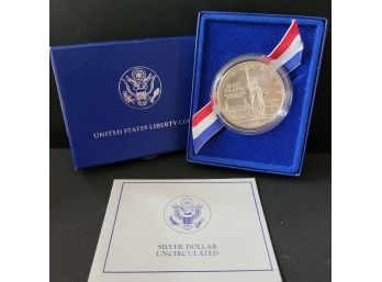 1986 U.S. Liberty Uncirculated Silver Dollar - Orig Box And COA