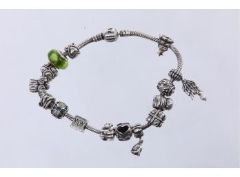 Sterling Pandora Bracelet With Retired Charms