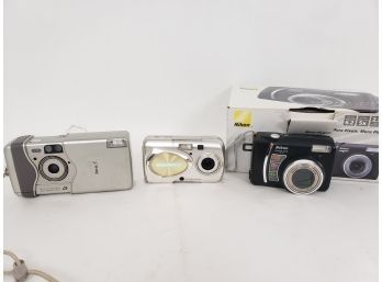 3 Digital Cameras,  Nikon, Olympus