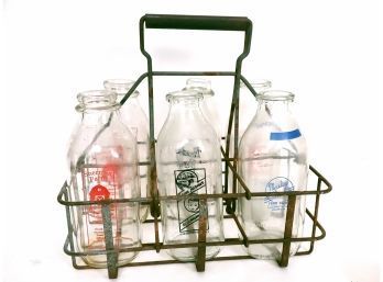 Collectin Of 6 Different Milk Bottles In Carry Case