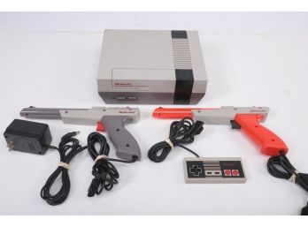 Nintendo Console W/ Controller And Guns