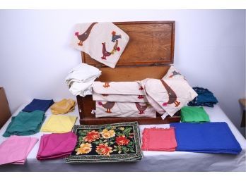 Vintage Wooden Chest Together With Large Group Of Cloth Placemats