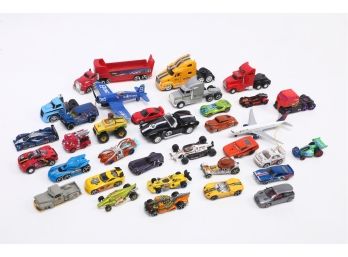 Large Group Of Small Toy Cars Trucks And Airplanes