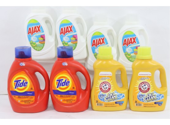 8 Bottles Of Laundry Detergent Includes Arm & Hammer, Ajax & Tide