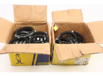 Two Boxes Of Approximately 35 Cushioned Pipe Clamps