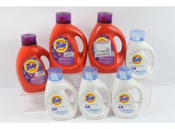 7 Bottles Of Tide Plus Febreze & Free & Gentle Detergent