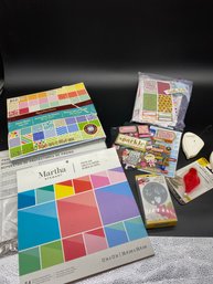 Assorted Scrapbooking Papers And Supplies