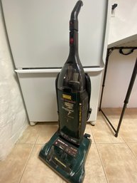 Hoover Self Propelled Wind Tunnel Vacuum And Some Cleaning Supplies