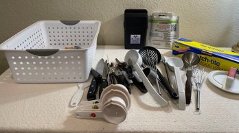 Kitchen Utensils And Plastic Food Wrap