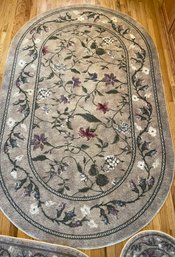 Three Matching Oval Rugs