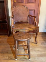 Armed Wicker Chair With Small Wooden Stool