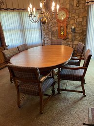 Wooden Dining Table & Upholstered Rolling Chairs