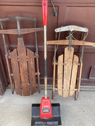 Two Vintage Wooden Sleds And Toro Power Shovel