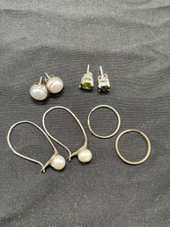 Four Pair Of  Silver Earrings