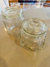 Two Short Glass Canisters