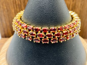 89 - 5x3mm Red Garnet Gemstone On Yellow GP Over Sterling Silver Tennis Bracelet - 7 Inch