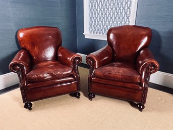 Pair Of Leather Armchairs With Rolled Arms & Nailhead Details