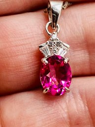 9x7mm Pink Topaz With White Zircon Rhodium Over Sterling Silver Pendant