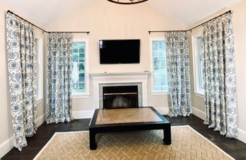 Four Panels Of Blue & White Window Treatments With Rings & Black Metal Rods