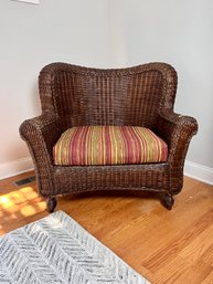 Dark Wicker Arm Chair With Cushion - Some Stain Chipped Off The Wicker