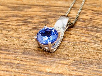 Single Round 7mm Tanzanite And Round White Zircon Rhodium Over Silver Pendant With 18 Box Chain