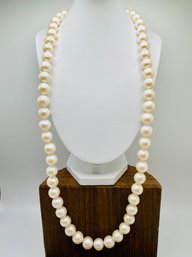 28 Inch 10-11mm White Cultured Freshwater Pearl Rhodium Over Sterling Silver Necklace