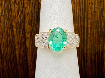 10k Yellow Gold Oval 9x7mm 1.77ct Emerald With Round White Zircon Ring - Size 4