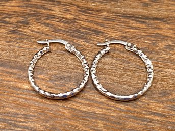 10k White Gold Diamond 16mm Cut Hammered Tube Hoop Earrings