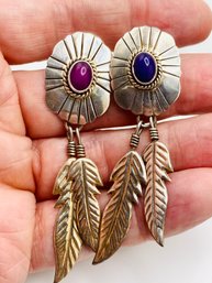 Silver Earrings With Purple Cabochon Gemstones And Dangling Leaf Pattern