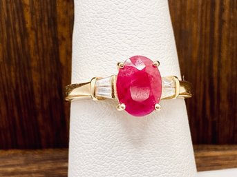 8x6mm Oval Ruby And 4 Baguette White Zircon On 14k Yellow Gold Ring - Size 6