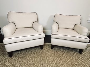 Pair Of Tan Arm Chairs With Black Contrast Piping