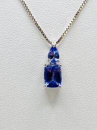 8x6mm Rectangular And 5x4mm Pear Tanzanite Rhodium Over Sterling Silver Pendant And 18' Silver Chain