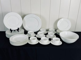 Set Of Crate And Barrel White With Silver Rim Dishes