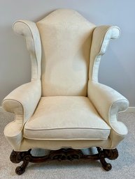 Antique Wing Chair With Cream Damask Fabric And Carved Wood Legs