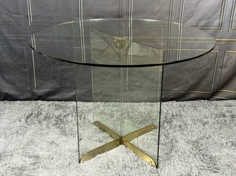 Round Glass Dining Table On X Base With Brushed Metal Detail