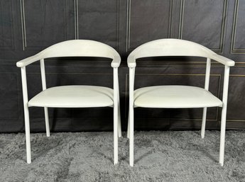 Pair Of CB2 White Faux Leather Dining Chair