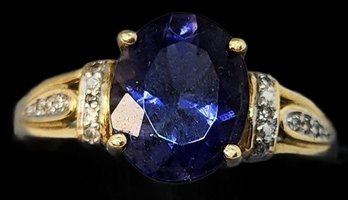 2 Ct Oval Size 6.75 Iolite Ring Set In 10kt Yellow Gold, 2.35 Total Weight Grams