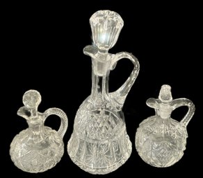 3 Pcs Crystal, 2-Cruets 3.5' Diam. X 6'H And Pitcher 4.25' Diam. X 11'H, All With Stoppers