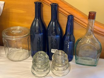 7 Pcs Glass Lot Including 3-Cobalt Blue Bottles And Paneled & Lidded Biscuit Jar