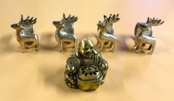 Lot: Four Reindeer Napkin Rings And A Buddha Incense Burner