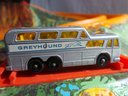 Lesney - 1960's Vintage # 66 Match Box Series - Coach -greyhound Emblems, Amber Windows, Painted Under Carriag