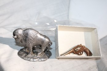 Vintage Handcrafted Pewter Buffalo Fiqurine 1.5'x3'x2.5' And Miniature Metal Pistol 2.5'x 1.5'