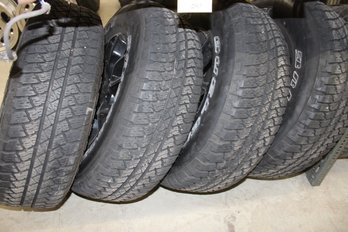 Lot245 - 4 Jeep Rims And Tires Bridgestone Dueler A/T 255/7018