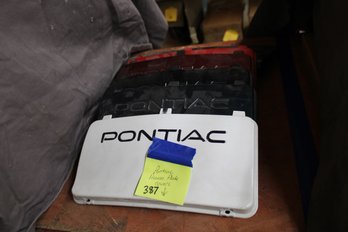Lot387 - GM Pontiac License Plate Covers See Pics