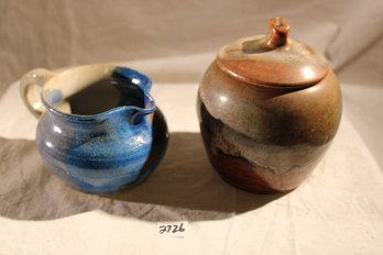 2 Pieces - Sm. Pottery Pitcher Blue/ Grey   Sm. Lidded Container ( Well Weighted)  Same Signature On Both