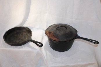 2 Cast Iron Pans (China)