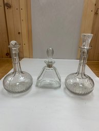 3 DECANTERS WITH TOPS