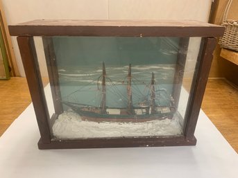 HOMEMADE MODEL SHIP WITH GLASS CASE. MISSING SIDE GLASS