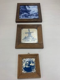 3 FRAMED BLUE AND WHITE CERAMIC TILES